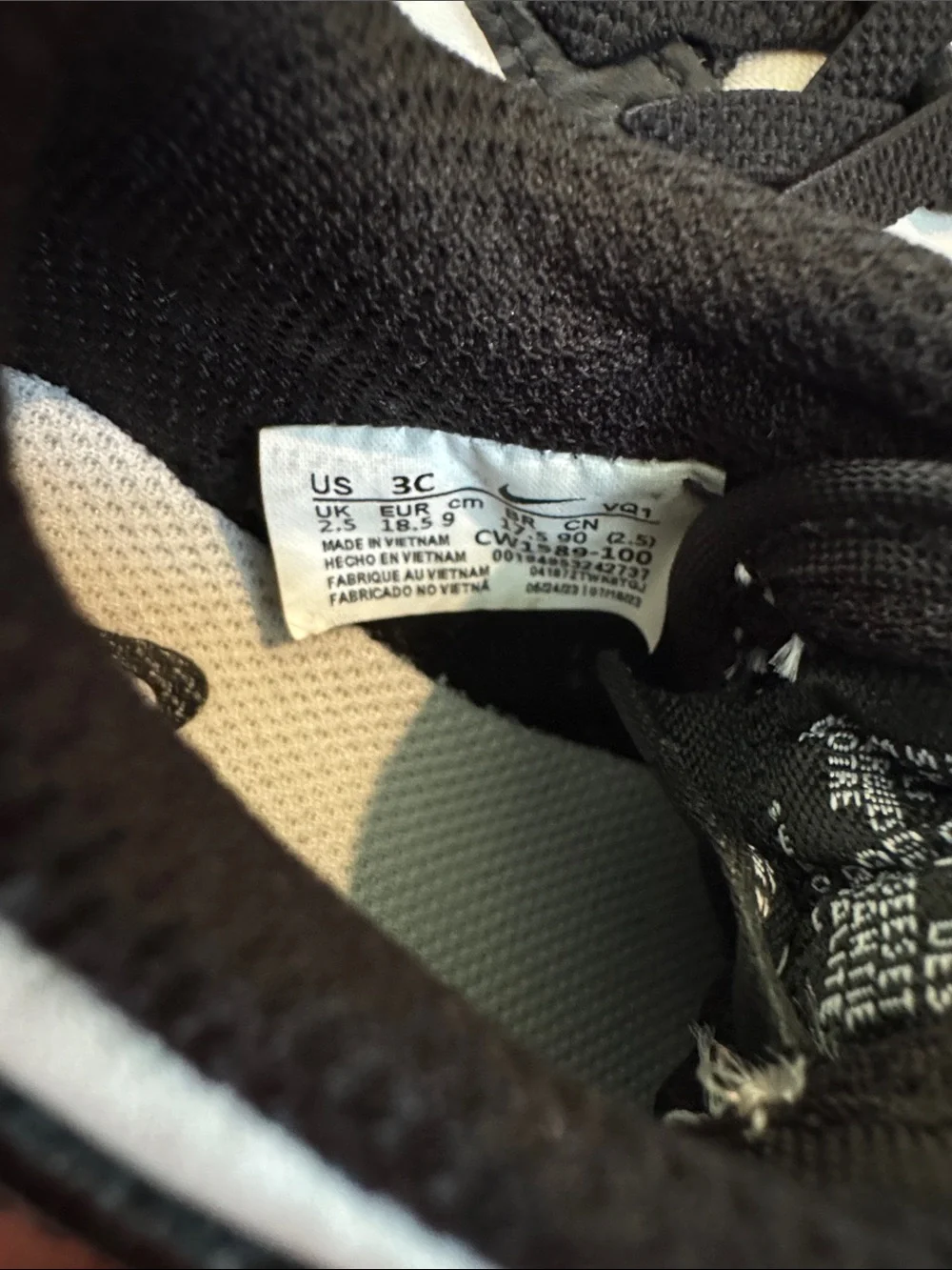 Nike Toddler Black and White Low-Top Sneakers